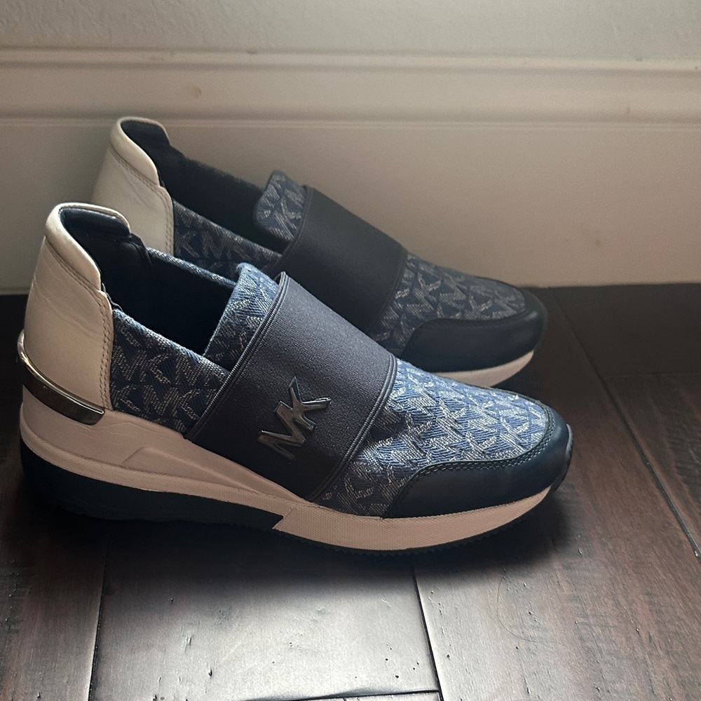 Michael Kors women’s Navy and Black Slip-On Sneakers